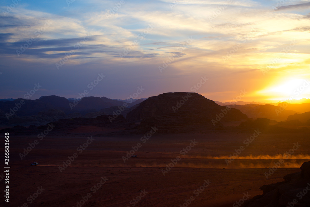 Wadi Rum Jordan Desert Evening with cars