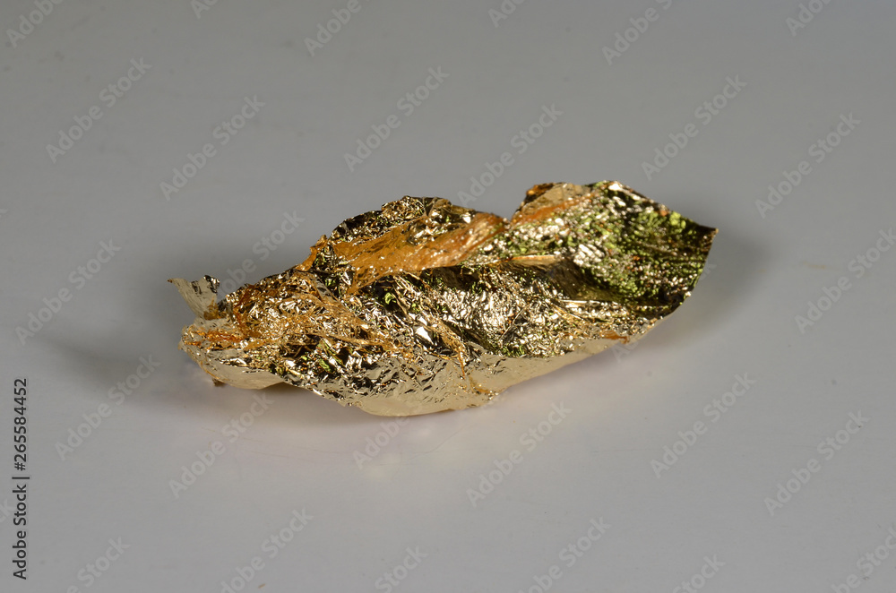 A piece of chemical pure Gold (Au) A piece of chemical pure Gold (Au)