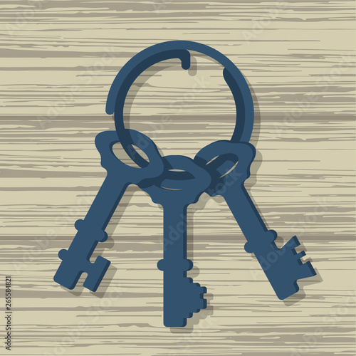 Bunch of old keys on an wooden background