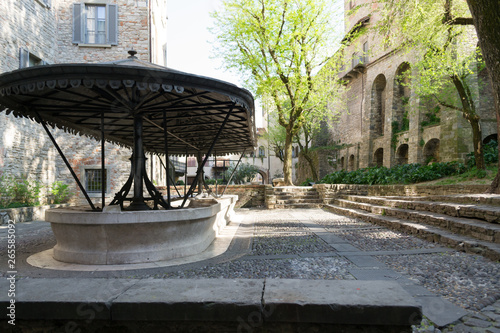 An ancient little square in Bergamo Alta the upper town, where people use to hand wash their clothes. It is a historical place with a fairy tale atmosphere remained unchanged from the past old days