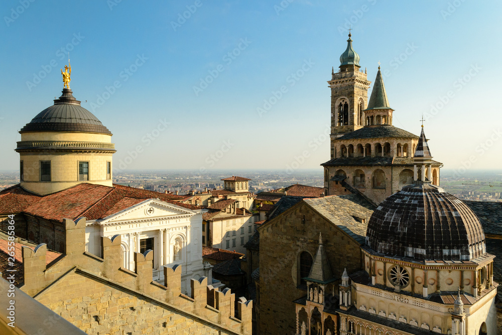 Bergamo Upper City, Italy, march 2019. The two main churches of this city, the Duomo and Santa Maria Maggiore, seen from the 