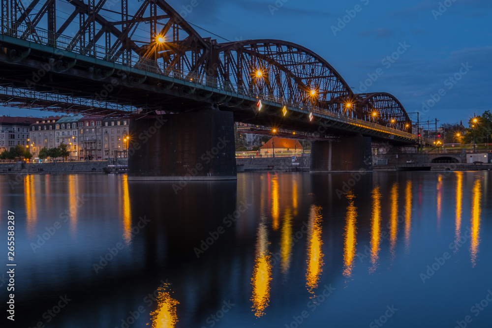 Railway bridge and Vltava river at night. Prague, Czech Republic