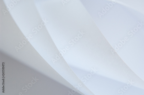 abstract background of a twisted sheet of white paper