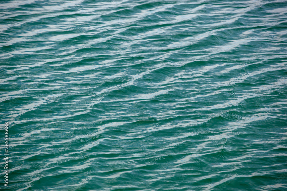 Ripples On Blue Water Surface Ripples On Blue Water Surface