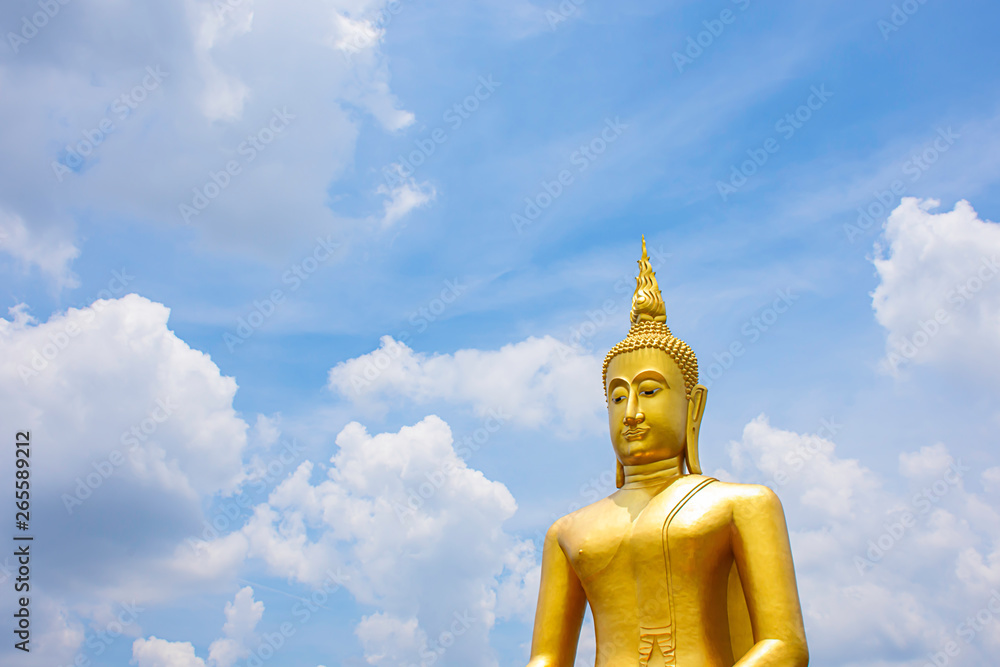 Big Buddha golden Background of sky and clouds at Wat Bang Chak in Nonthaburi , Thailand.