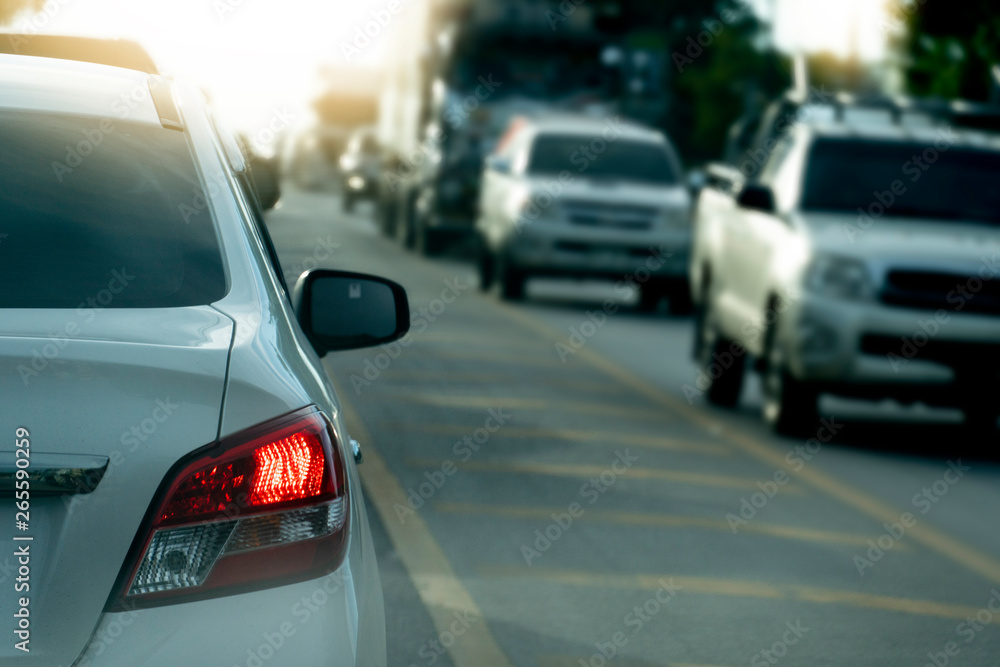 Brake cars on asphalt roads during rush hours for travel or business work.