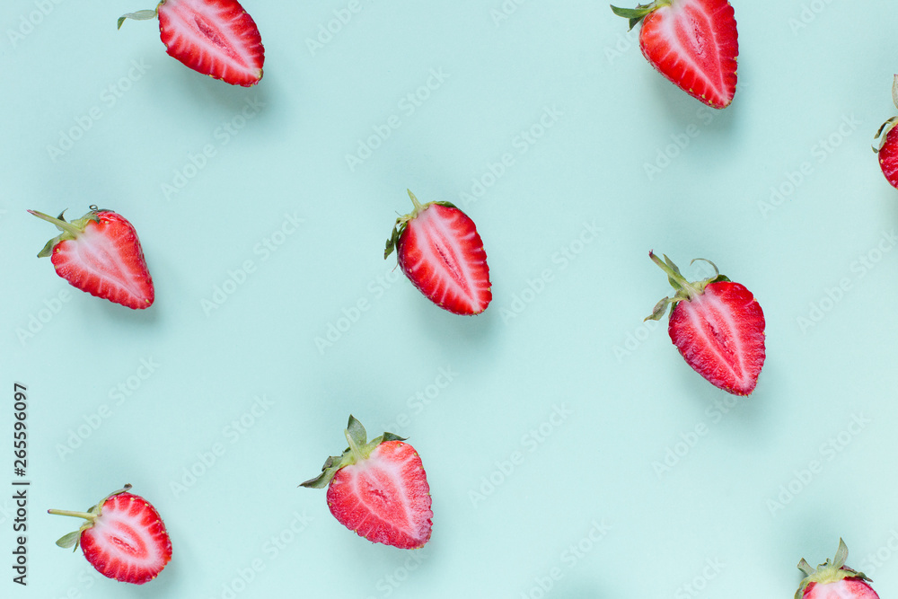 green background with fresh Strawberry halves green background with fresh Strawberry halves