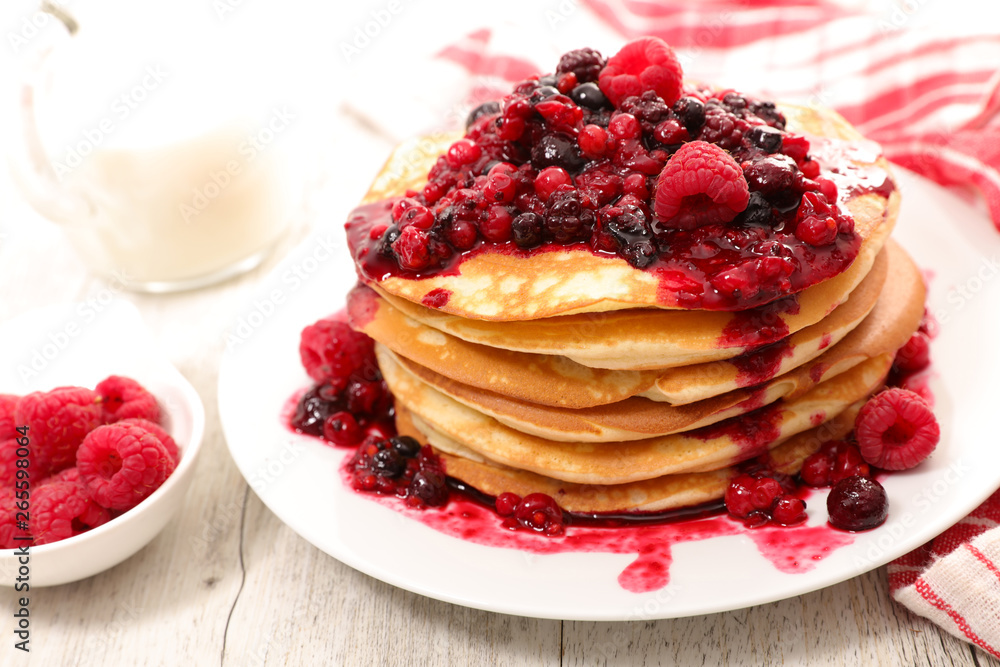pancake with berry fruit sauce pancake with berry fruit sauce