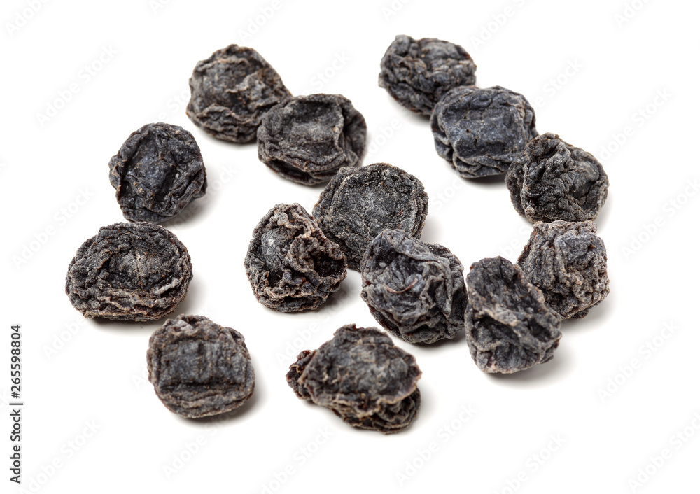 Dried black plums isolated on white background Dried black plums isolated on white background