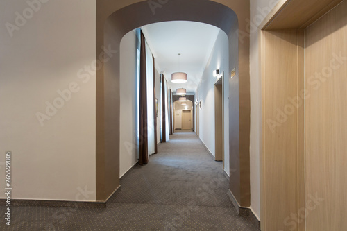 Interior of a hotel corridor with doors © rilueda