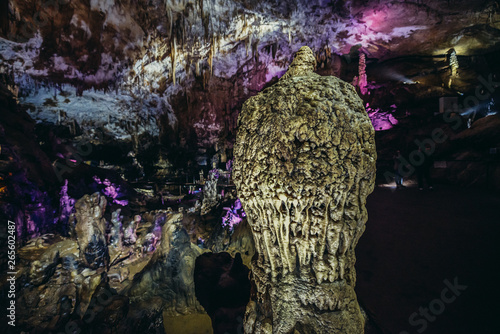 Illuminated Prometheus Cave in Imereti province, Georgia photo