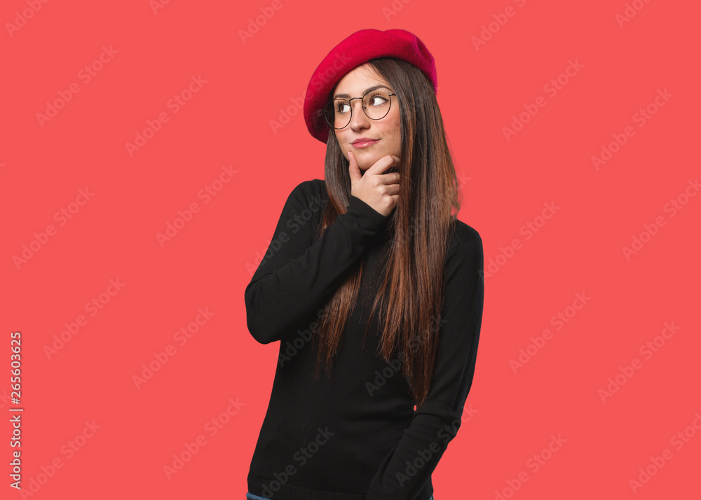 Young artist woman thinking about an idea Young artist woman thinking about an idea