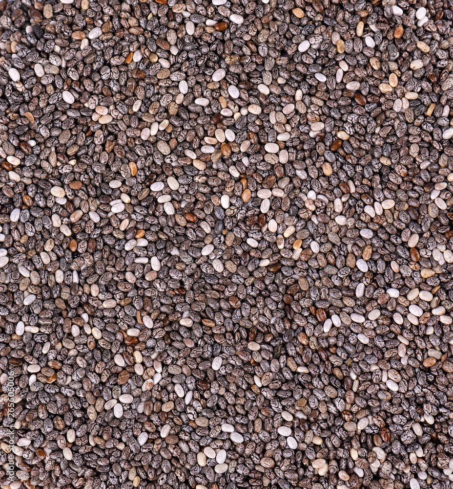 Chia seeds background. Healthy superfood. Closeup macro of small organic chia seeds. Chia seeds background. Healthy superfood. Closeup macro of small organic chia seeds.