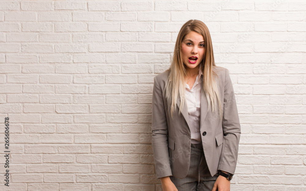 Young russian business woman screaming very angry and aggressive Young russian business woman screaming very angry and aggressive