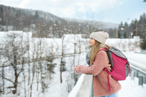 Beautiful woman at snowy re...