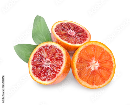 Cut blood oranges on white background