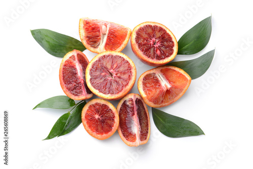 Cut blood oranges on white background