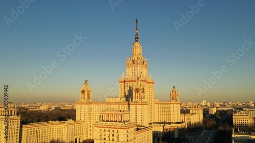 Aerial view of Stalin's skyscraper, Moscow University on sunset in spring. Moscow river. Russia. Bird’s view point.