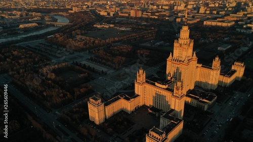 Aerial view of Stalin's skyscraper, Moscow University on sunset in spring. Moscow river. Russia. Bird’s view point.