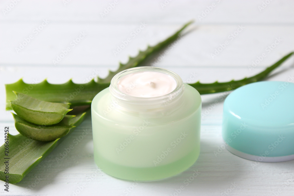 cream with aloe vera on a light background. Aloe vera skin care. Moisturizing and skin care. cream with aloe vera on a light background. Aloe vera skin care. Moisturizing and skin care.