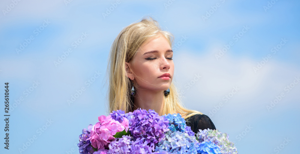 Girl tender blonde hold hydrangea flowers bouquet. Allergy free life. Stop allergy blooming season. Enjoy spring without allergy. Springtime bloom. Pollen allergy. Gentle flower for delicate woman Girl tender blonde hold hydrangea flowers bouquet. Allergy free life. Stop allergy blooming season. Enjoy spring without allergy. Springtime bloom. Pollen allergy. Gentle flower for delicate woman