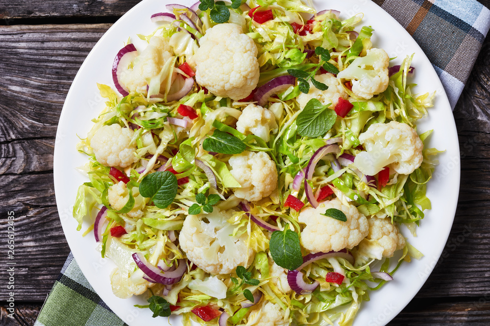 close-up of healthy cauliflower salad, top view close-up of healthy cauliflower salad, top view
