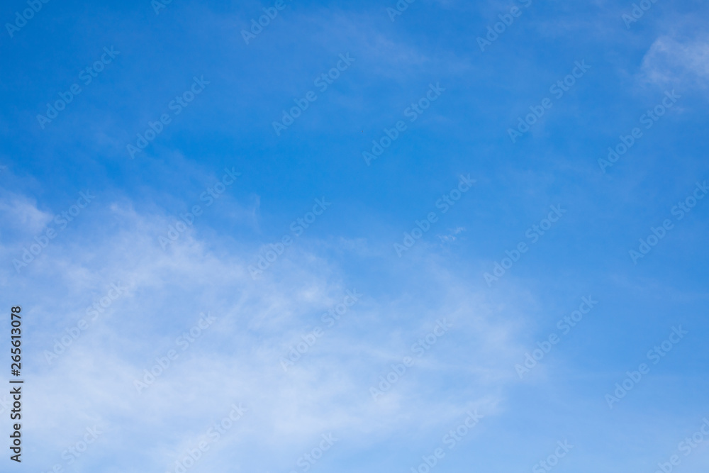 The background of a beautiful sky with a thin white cloud