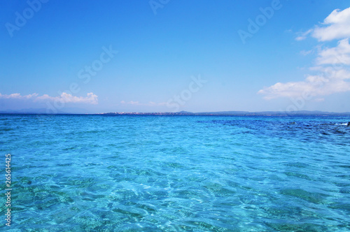 Transparent clean sunny ocean sea water waves for background and texture. © Payllik