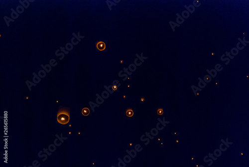 Fototapeta Naklejka Na Ścianę i Meble -  Light up lanterns flying to the sky at night