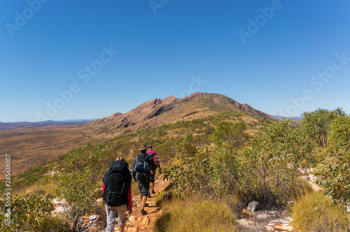 a group of Hikers on the way to the top of Mount Sonder just outside Alice Springs, West MacDonnel National Park, Australia © Martin