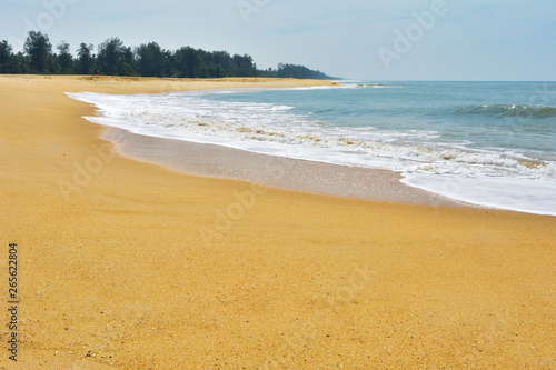 Photography Soft wave lapped the sandy beach