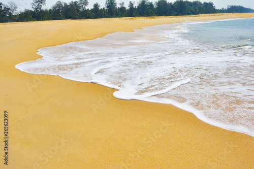 Photography Soft wave lapped the sandy beach