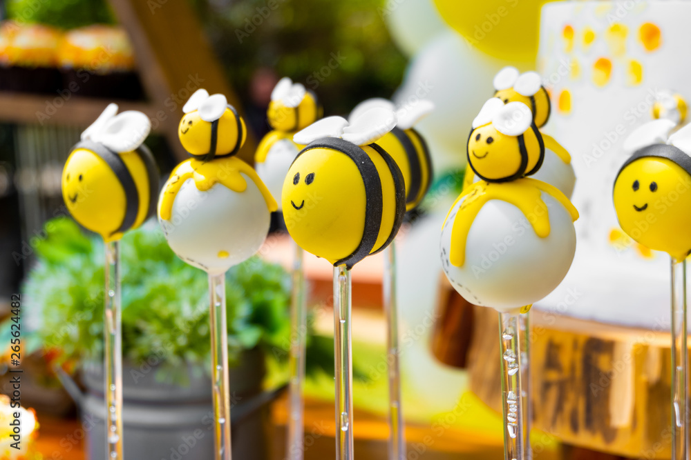 Bee themed birthday, bee shaped candies for newborn and baby shower party  Stock Photo