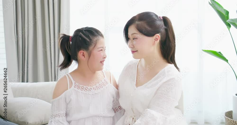 daughter whisper to mom