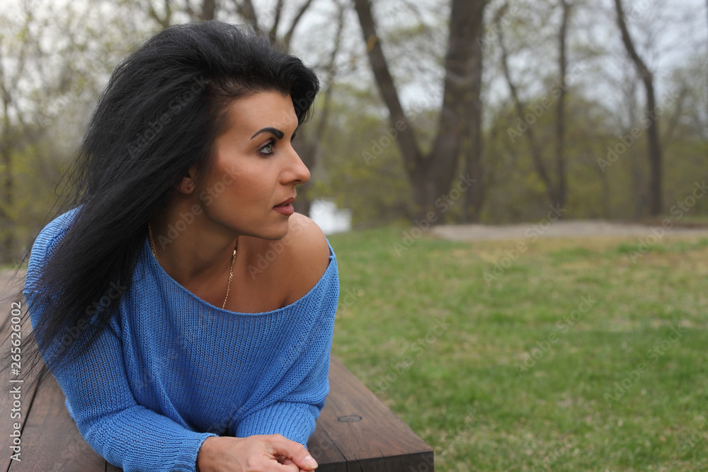 portrait of a young beautiful woman in the park portrait of a young beautiful woman in the park