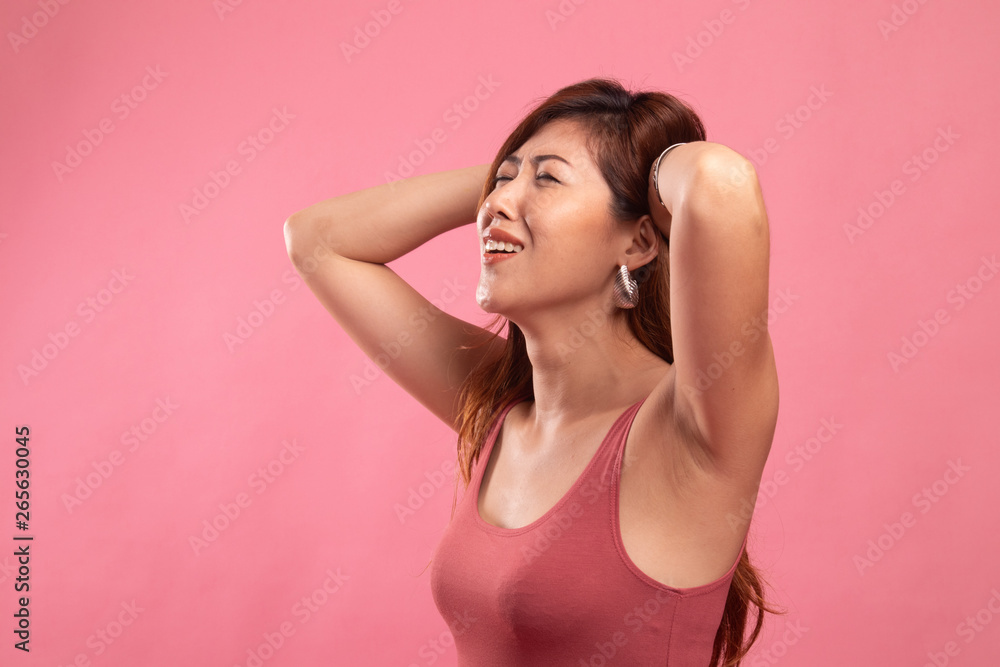 Stressed young Asian businesswoman scream out. Stressed young Asian businesswoman scream out.
