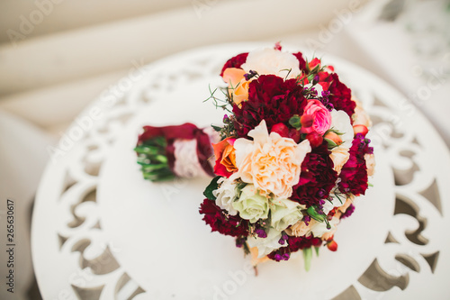 Beautiful wedding bouquet with different flowers, roses
