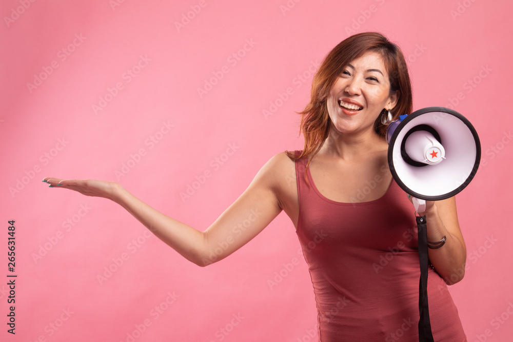 Beautiful young Asian woman announce with megaphone. Beautiful young Asian woman announce with megaphone.