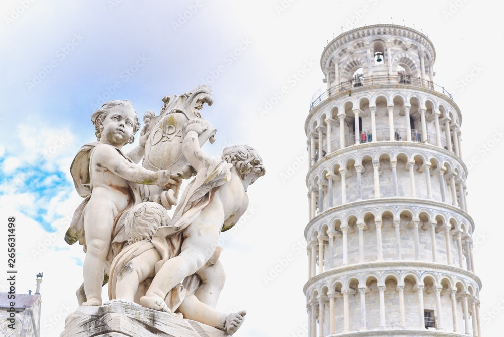 Cherub Statue and the Leaning Tower of Pisa in Italy