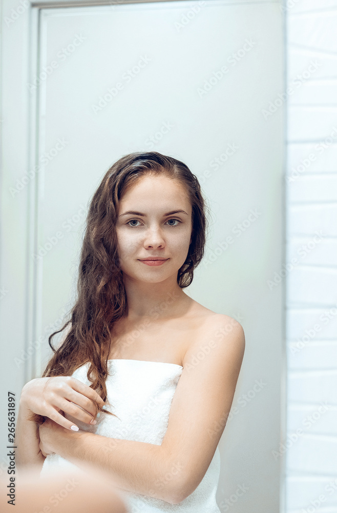 Wet hair woman portrait, beauty hair healthy skin care concept, beautiful model with wet hair in bathroom. Wet hair woman portrait, beauty hair healthy skin care concept, beautiful model with wet hair in bathroom.