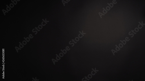 Black background or dark background backdrop in studio shooting.