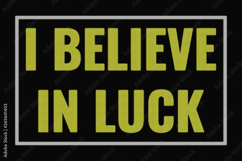 I Believe In Luck text on dark screen