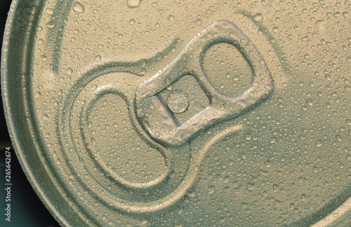 Cold drink in metal can with water drops 