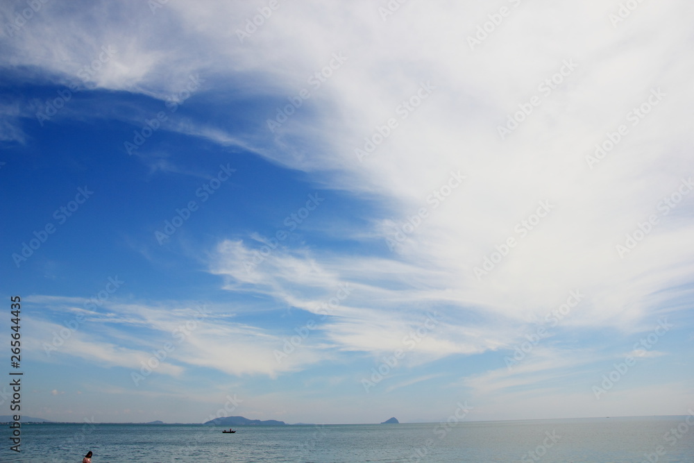 Obraz premium Blue sky with clouds over the sea for background, wallpapers, seascape and clear sky background.