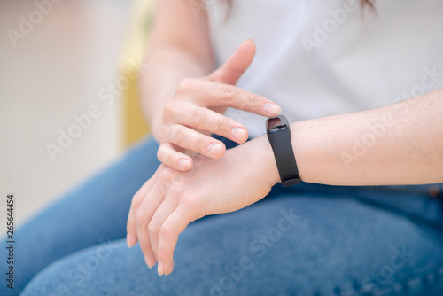 Female hand with smart bracelet.Smart watch on the wrist.