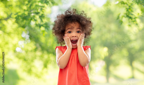 Fotografía childhood, expressions and emotions concept - surprised or scared little african