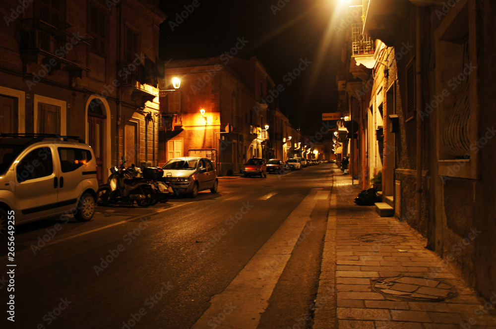 Night evening streets in the old European southern tourist city on the southern island.