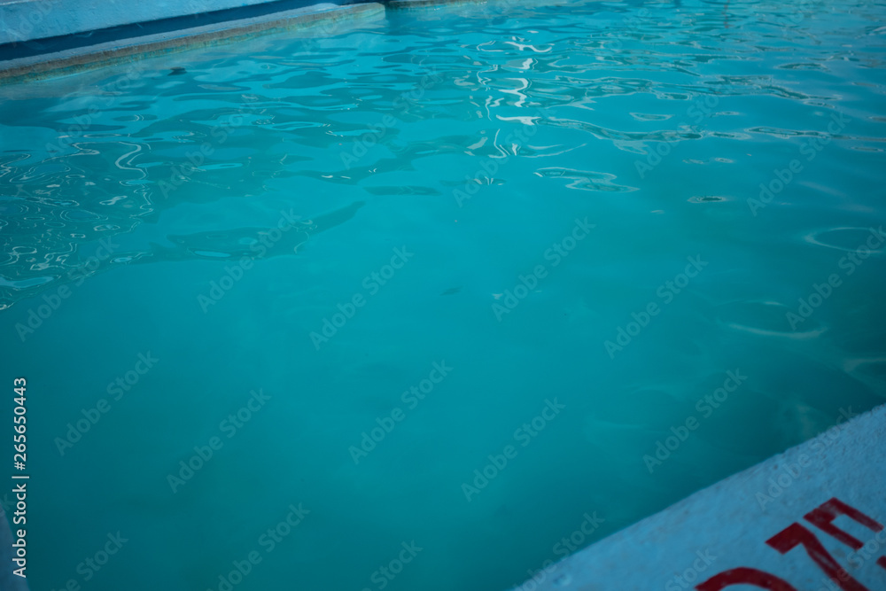 Inviting blue pool with ripples on the surface