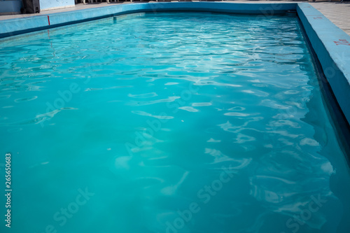 Inviting blue pool with ripples on the surface