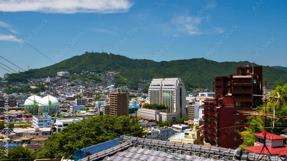 Nagasaki, Japan. A timelapse during the sunny day in Nagasaki, Japan, with a view over the entire center, including the hills. Nagasaki, Japan. A timelapse during the sunny day in Nagasaki, Japan, with a view over the entire center, including the hills.